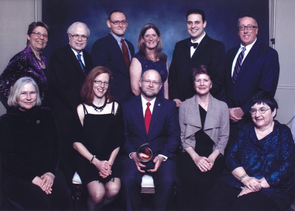 EAC Board Members, Staff, and Volunteers present to accept the Green Excellence Award at the Chamber of Commerce Gala: Kari Sandhaas, George Gordon, Ken Springer, Cindy Golliday, Carlo Robustelli, Tim Golliday, Charlotte Brown, Beverly Beyer, Michael Brown, Laurine Brown, and Myra Gordon pictured
